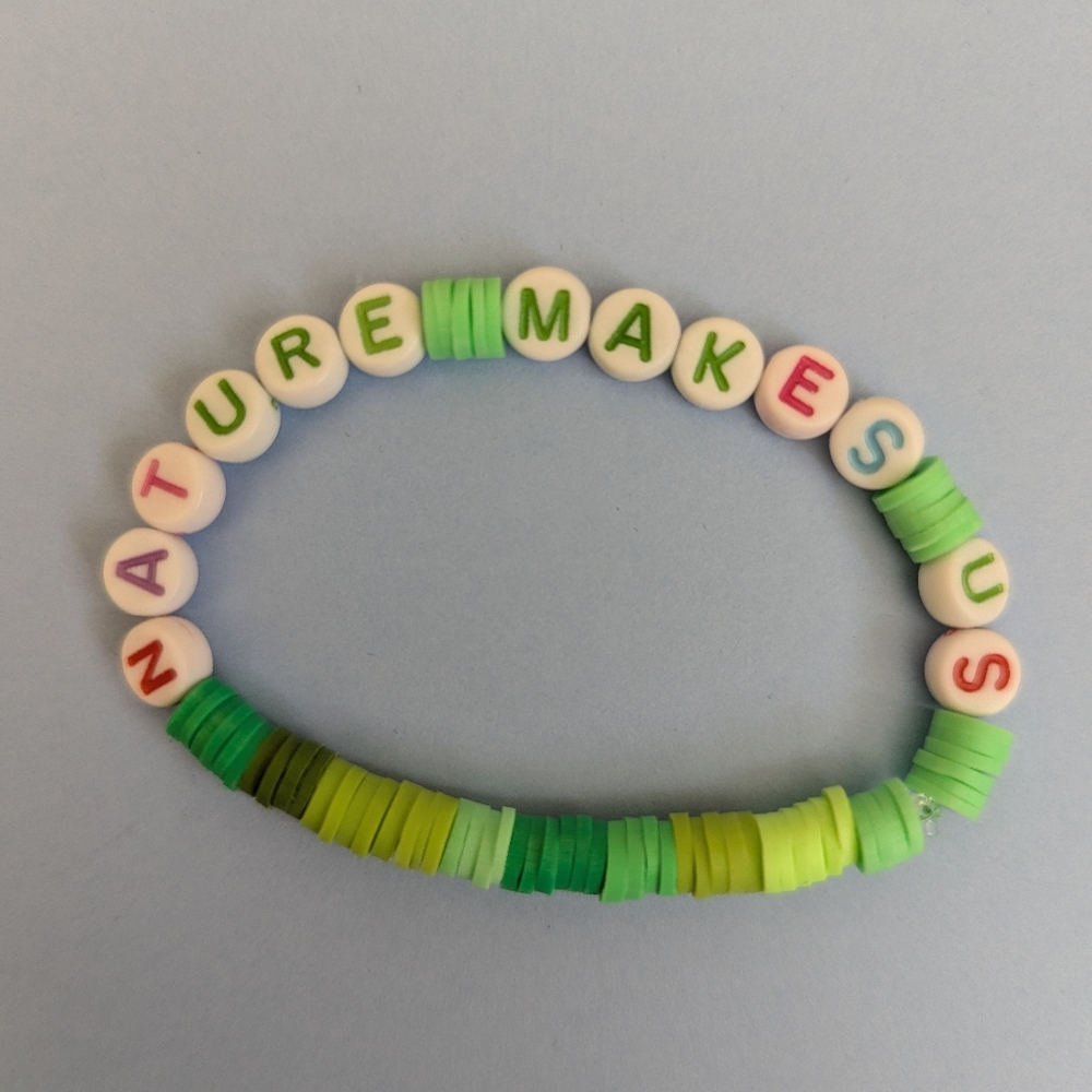 Handmade "Nature Makes Us" clay bed bracelet